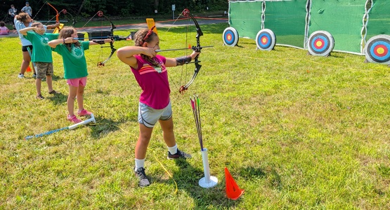 Campers on the archery range at Long Branch County Park.