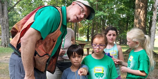 Campers learning how to use a compass.