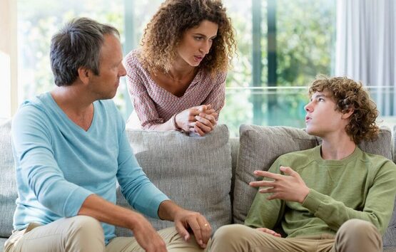 parents and teen communicating