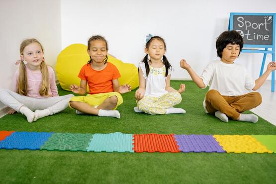 kids practicing yoga
