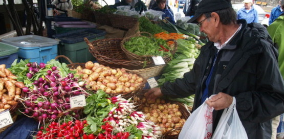 older gentleman shopping at the farmers' market