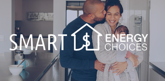 couple with baby in kitchen of home, under text Smart Energy Choices 