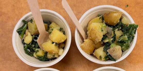 Smashed potatoes and kale prepared during a cooking demonstration