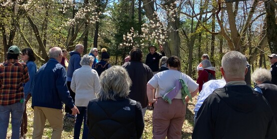 group of people on a spring tour in durand