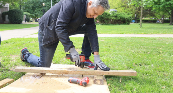 An Energy Warriors trainee practices using a power drill during training.