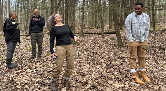 People walking on property with trees