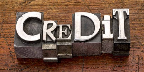 Credit word in metal type 