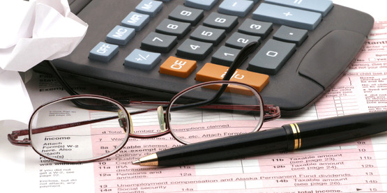 tax return, eye glasses, calculator