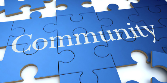 jigsaw puzzle spelling out the word "Community"