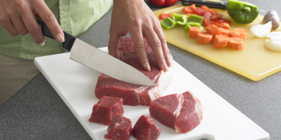 Use separate cutting boards for meats and produce