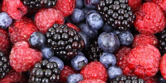 a picture of blueberries, raspberries and blackberries