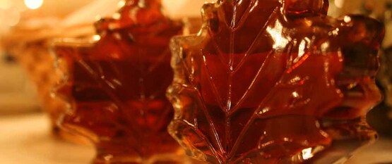 maple syrup in leaf-shaped glass bottles