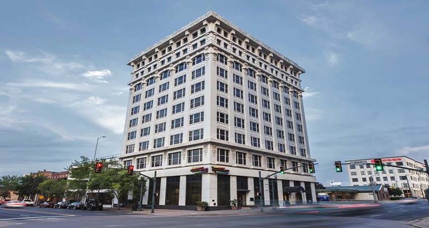 The neo-classical building was built with steel and previously housed several offices on the top floors.