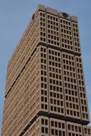 Each window of the tower has panels that provide shade from the sun, from afar giving the tower its unique “waffle maker” appearance. National Archives of Singapore.