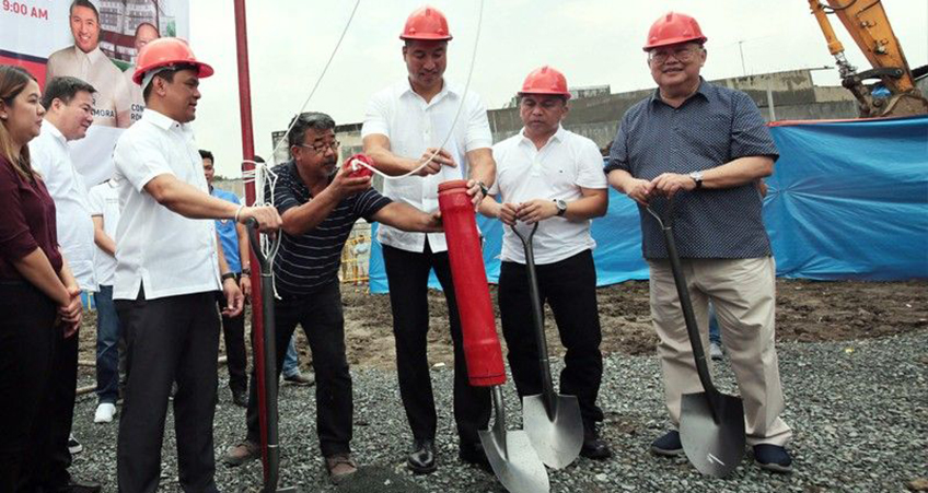 A groundreaking ceremony is held for a much-needed public housing tower in San Juan City.