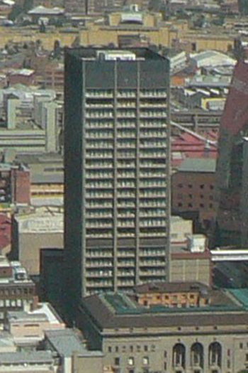 The former building rose 26 stories, with a total height of 377 feet (115 meters).