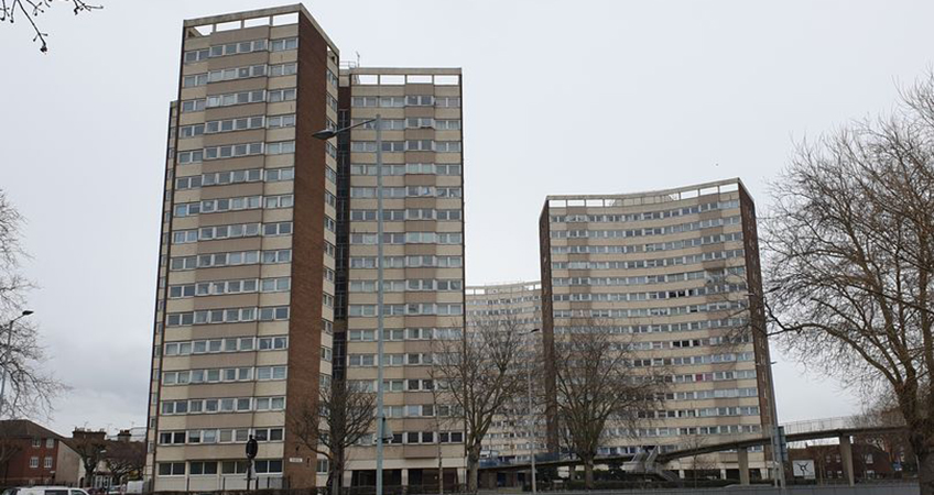 Along with 12, two-story flats, the four towers are set to be demolished.