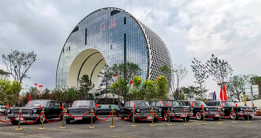 The new, semi-circular building is located in Changchun's International Auto City, which is a hub for the auto industry.