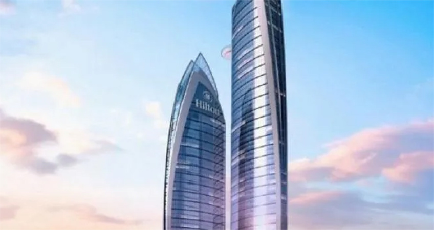 The dual-tower complex has been placed on hold following an alleged breach of contract.