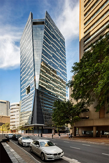 The glass-clad tower recently completed construction at a final height of 86 meters.
