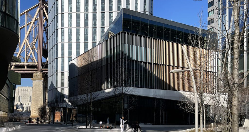 The Graduate Hotel seen behind the low-rise Verizon Executive Education Center. Photo by Michael Young