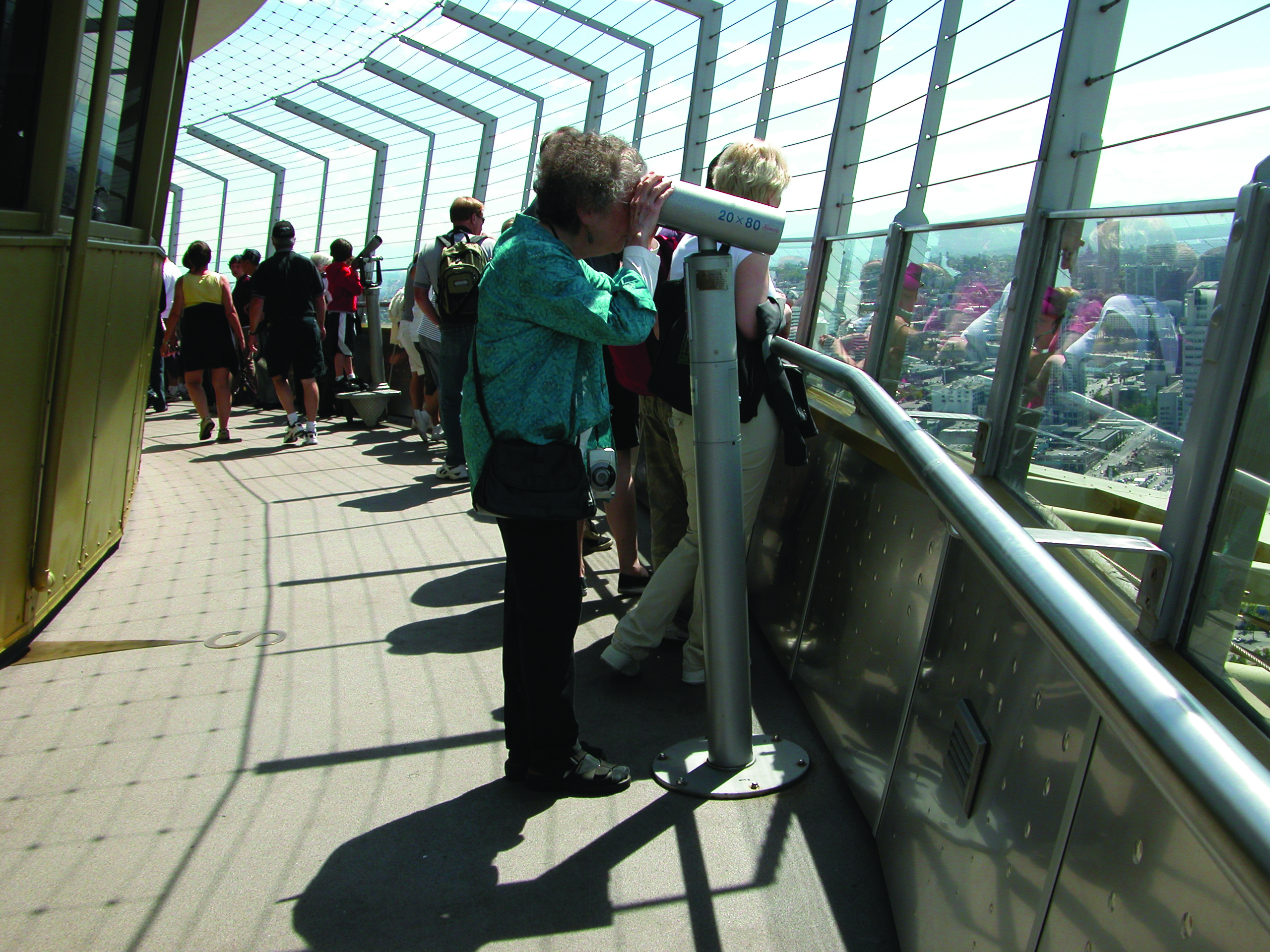 Figure 4. Contemporary and recently renovated observation decks, such as this one at Seattle’s Space Needle (1962, observatory at 161 m), have replaced mesh or wire fall-protection barriers with less-intrusive glazed systems.