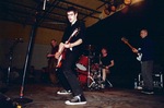 <a href='/fugazi_live_series/charlotte-nc-usa-32396'>Fugazi, Tremont Music Hall, Charlotte NC 3/23/1996 - Photo ©️ Koji Harmon</a>