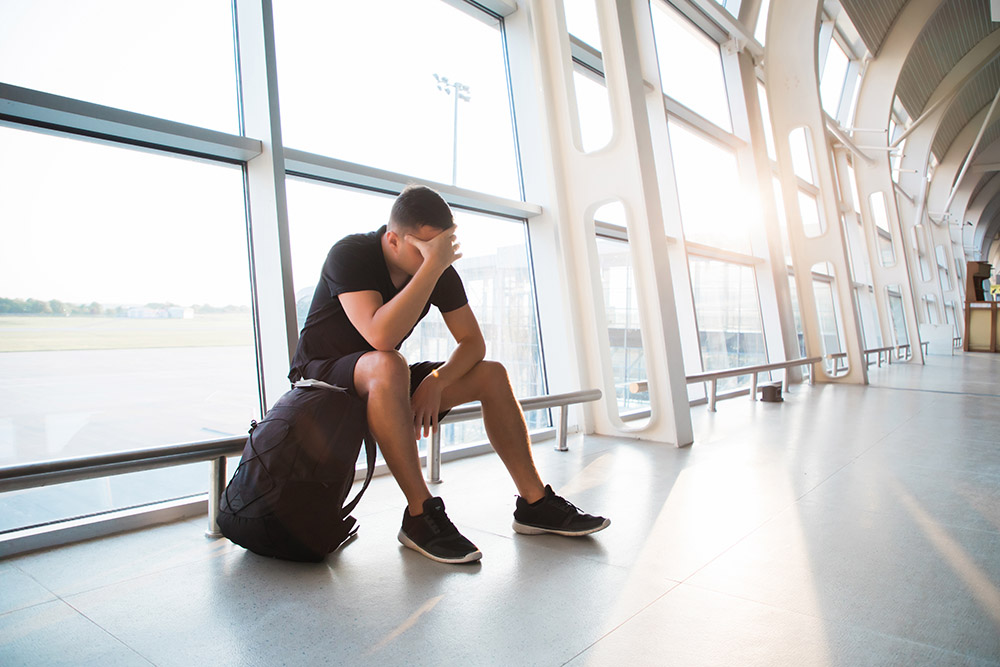 Stressed man at airport 