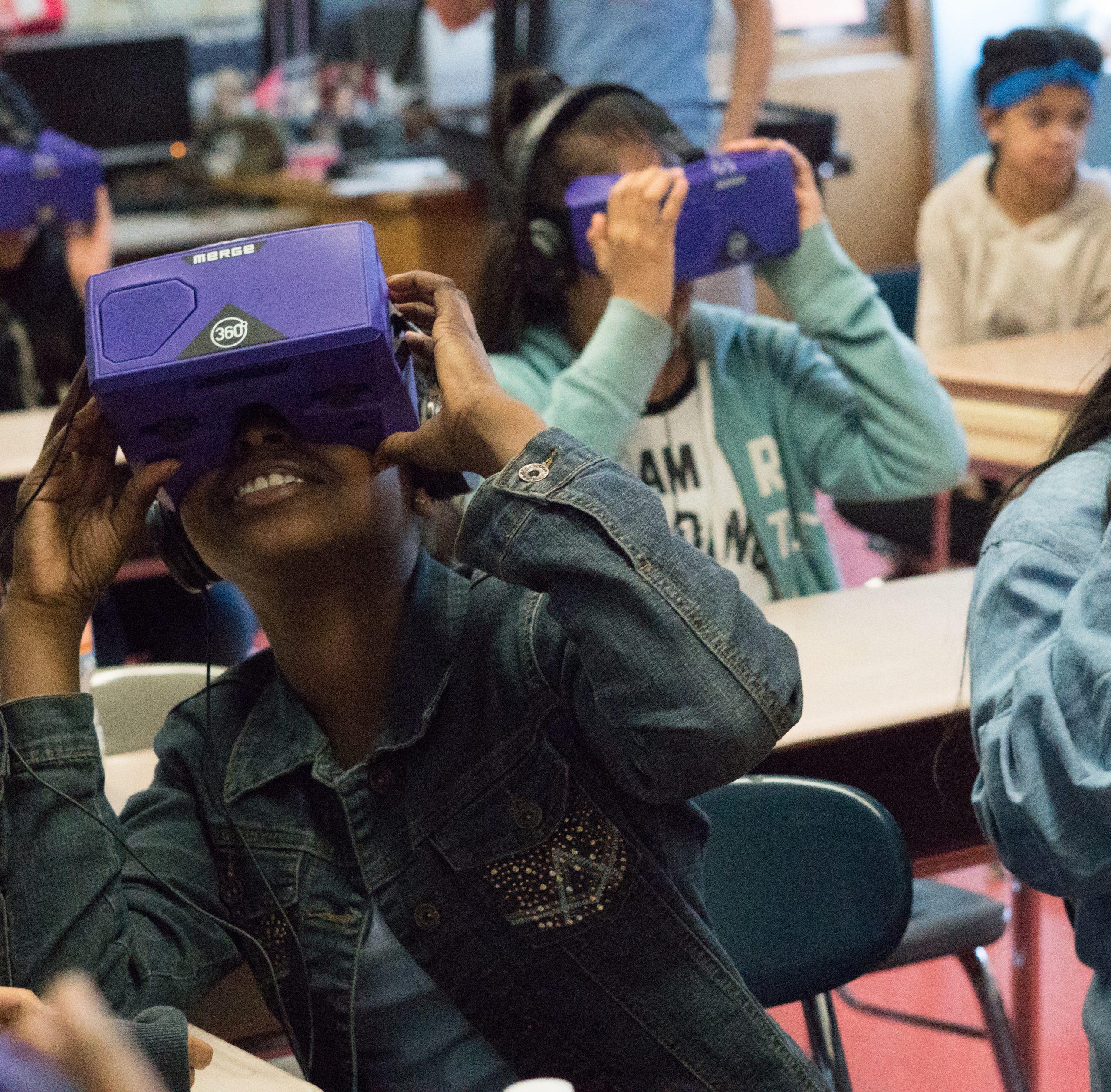 Students in VR headsets. Students in VR headsets.
