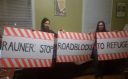 Jewish Voice for Peace members prepare protest signs for a demonstration in Chicago Wednesday.
