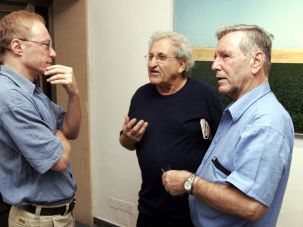 Grossman, left, speaks with the novelists A.B. Yehoshua, center, and Amos Oz, left, in 2006.