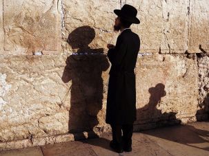 An Orthodox man prays at the Western Wall in the Old City of Jerusalem.