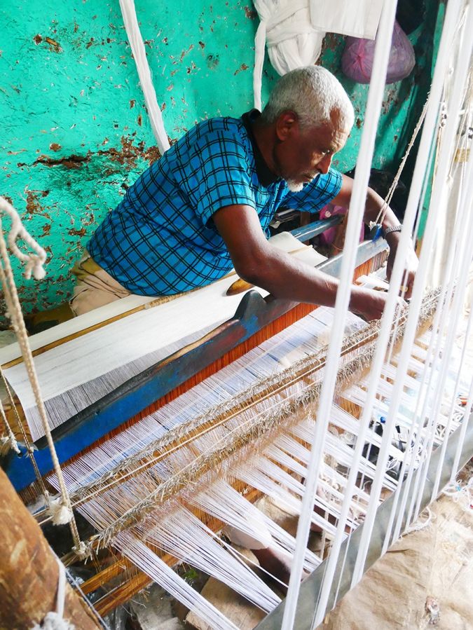 Ethiopian Jews weaving tallitot, prayer shawls