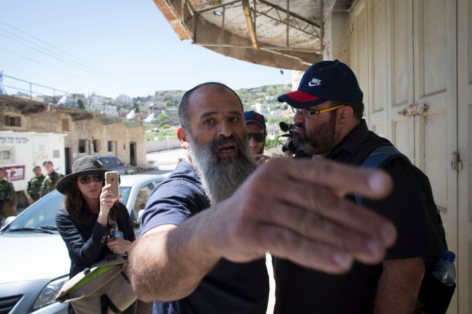 Settlers who felt the tour was biased and inaccurate dogged the group.