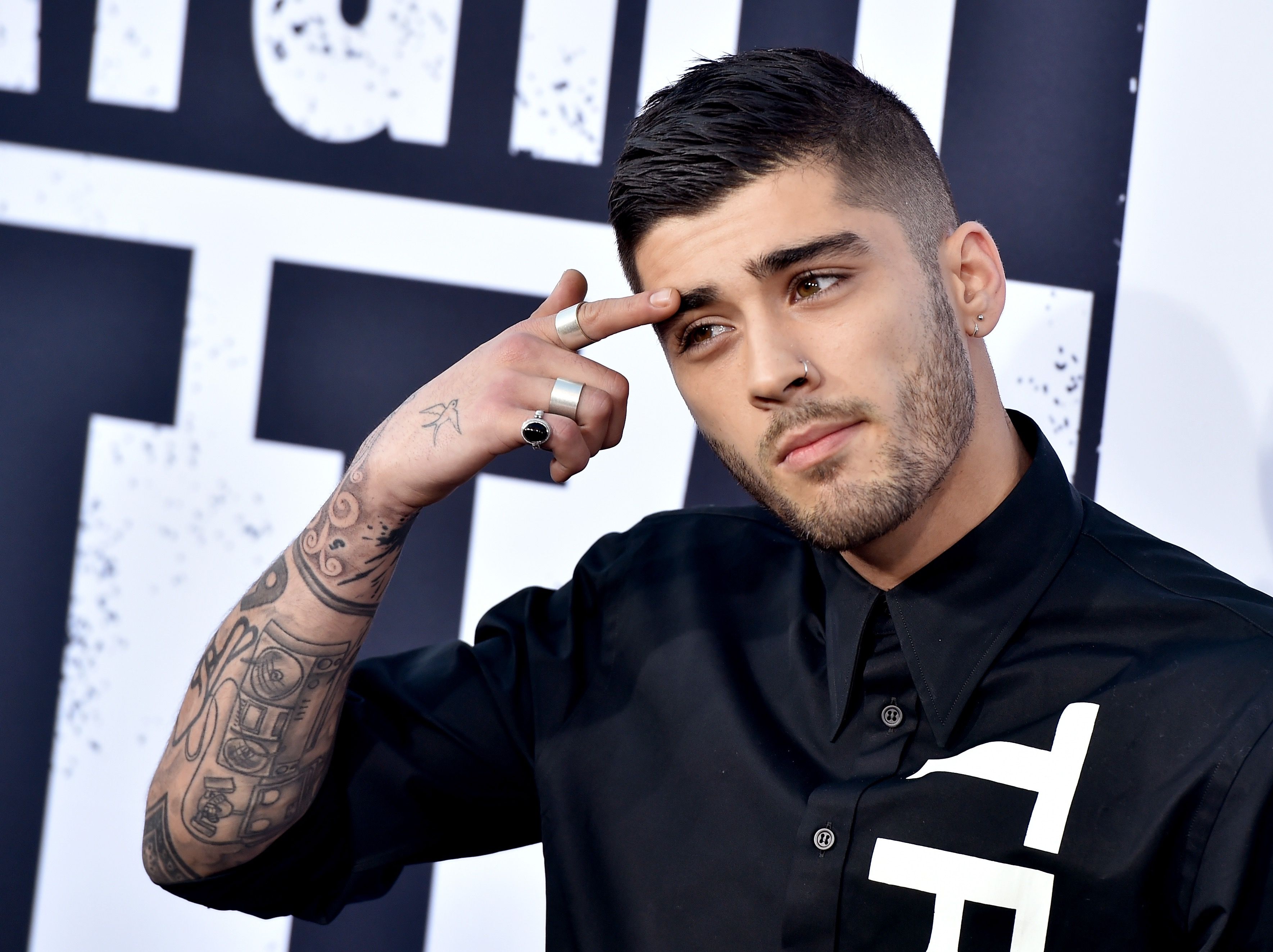 Singer Zayn Malik arrives at the premiere of Universal Pictures and Legendary Pictures' 'Straight Outta Compton' at the Microsoft Theatre on August 10, 2015 in Los Angeles, California.