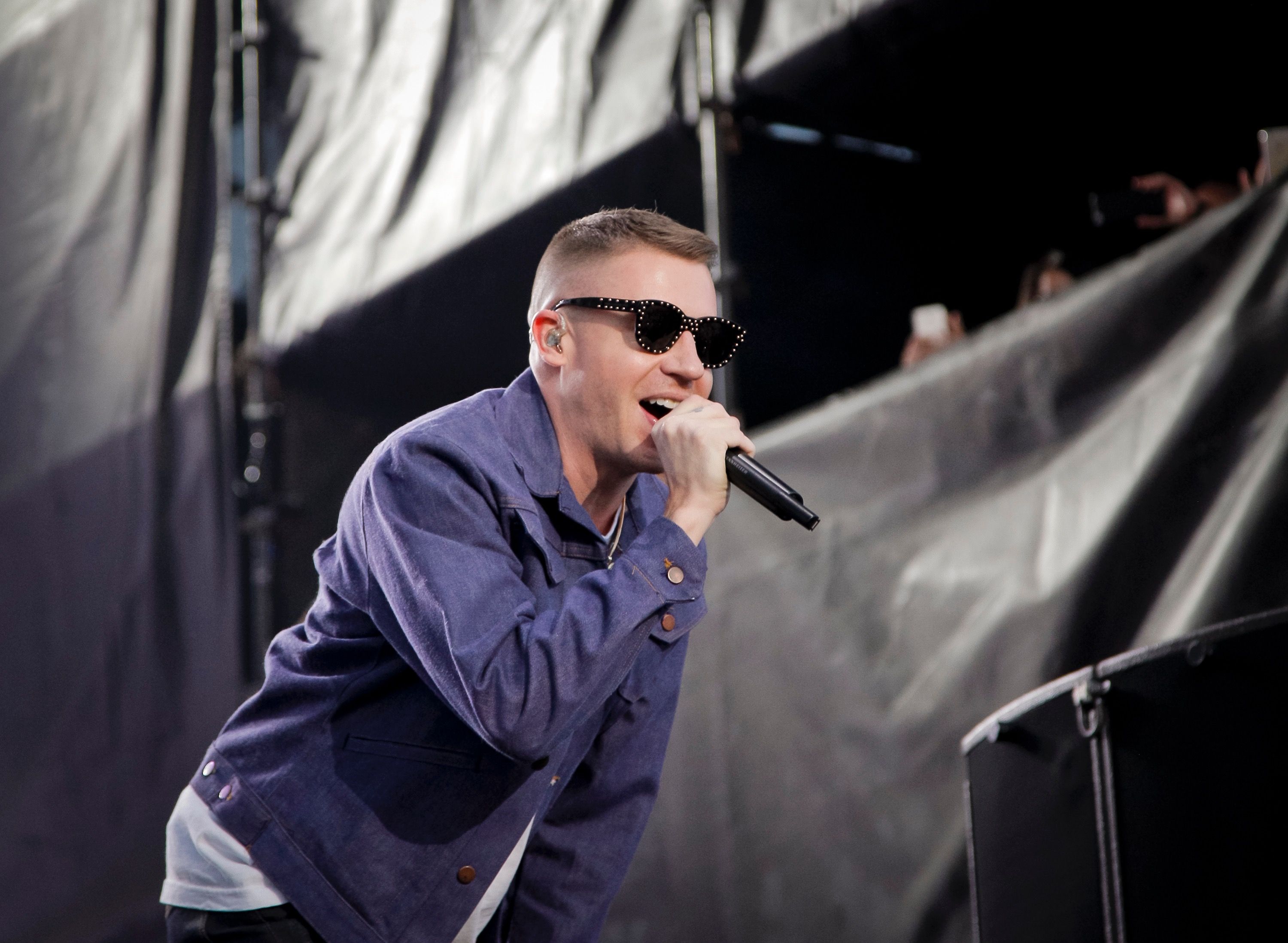 Macklemore of Macklemore and Ryan Lewis performs at the March Madness Music Festival on April 2, 2017 in Margaret T. Hance Park in Phoenix, Arizona.