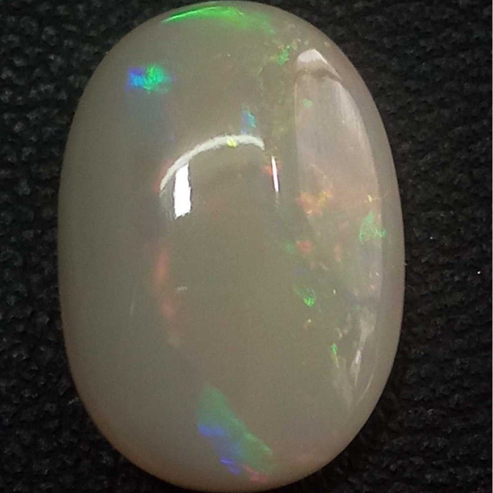 4.99ct oval multicolored opal