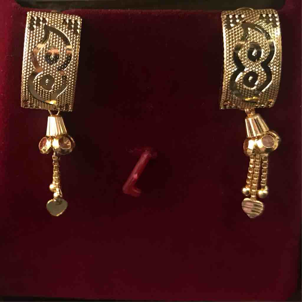 916 gold fancy devils eye earrings