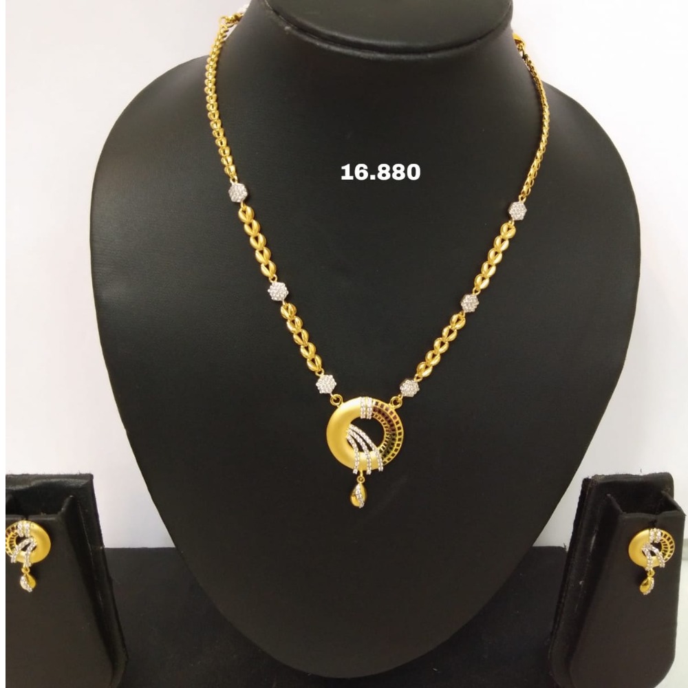 18 carat gold chain set.