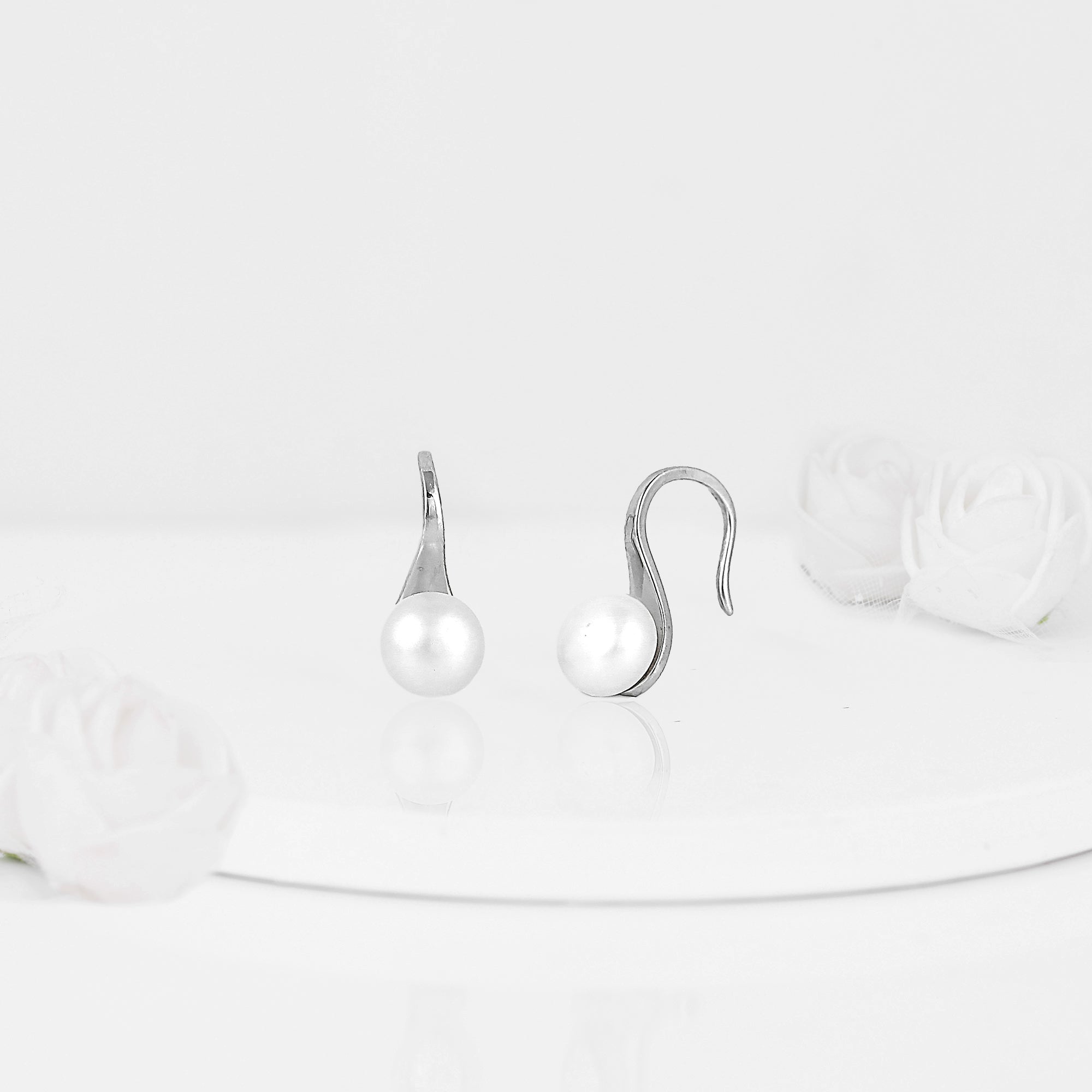 Silver pearl tiny stud earrings - Image 5