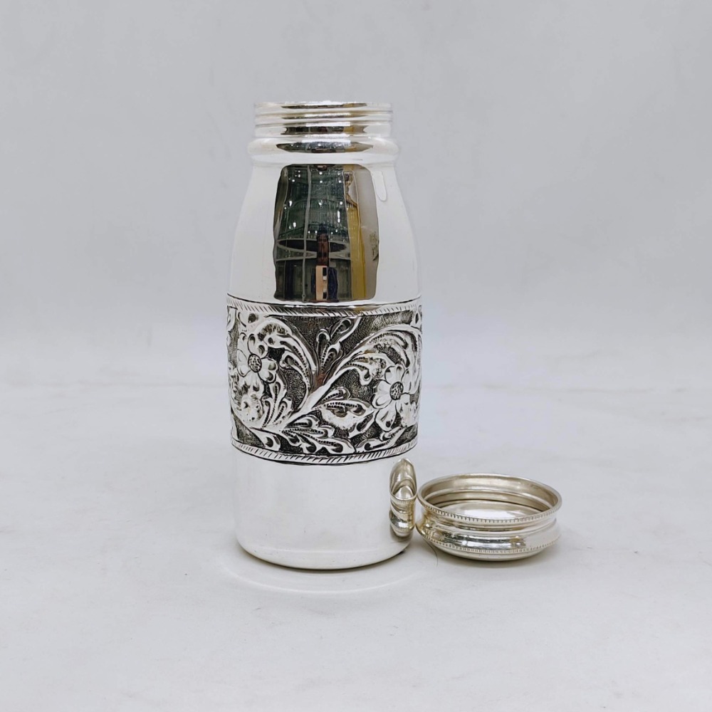 Hallmarked silver bottle in fine antique centre floral design carving - Image 2