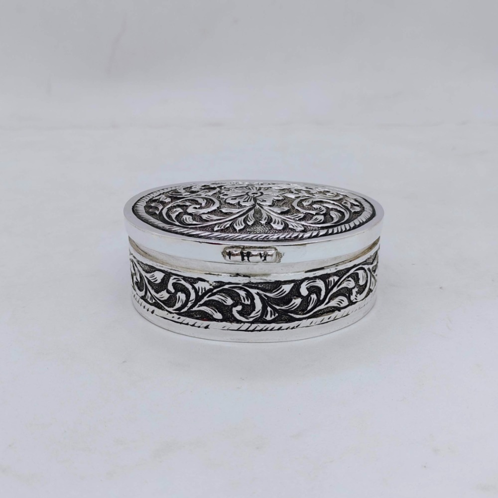 Real silver box for gifting in antique oval shape in fine carvings