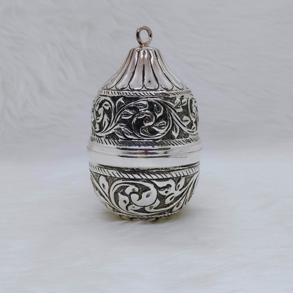 Pure silver nariyal in antique carvings for pujan and tilak