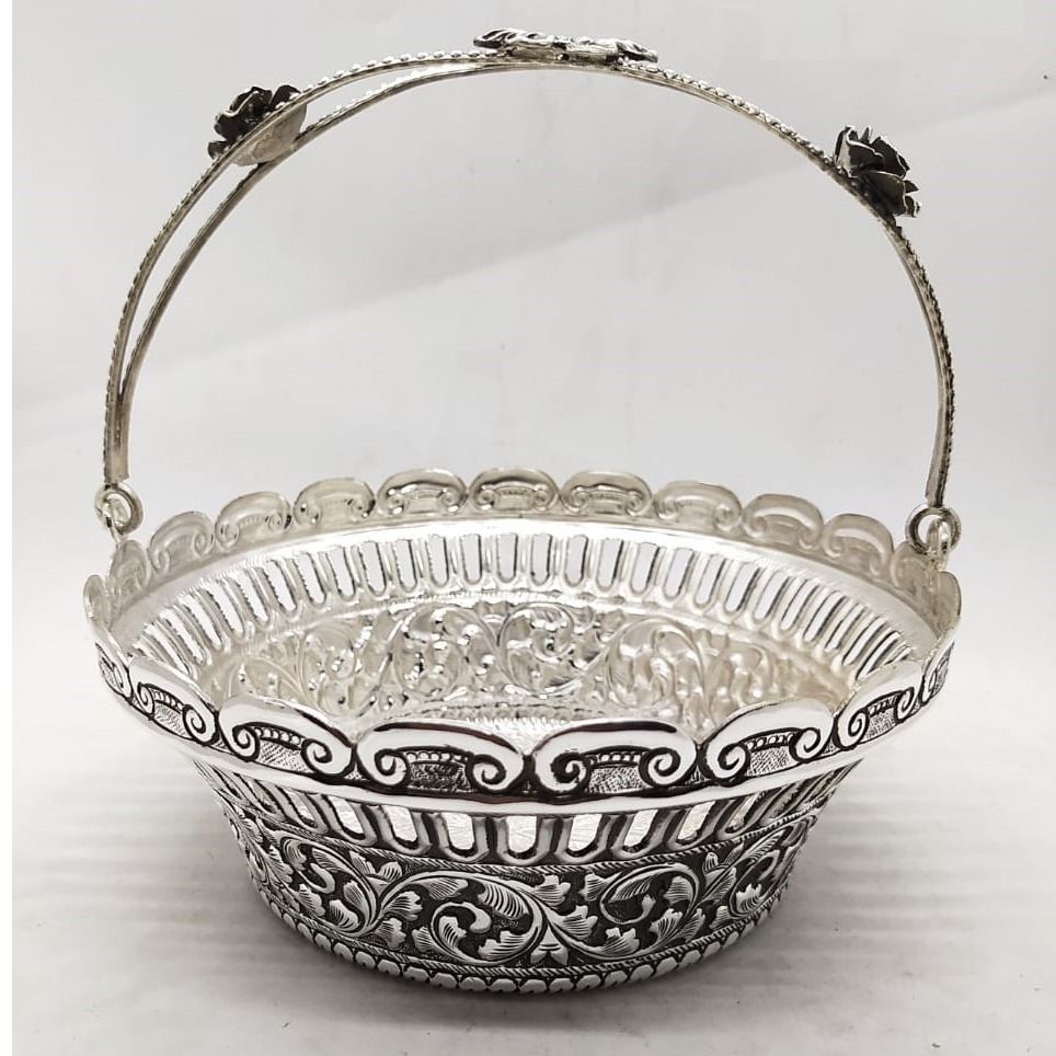 Puran pure silver flower tokri with handle in antique carving.