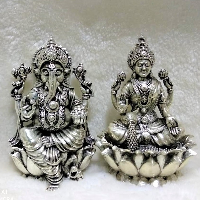 Pure silver lakshmi ganesh idols in high finishing po-138-09