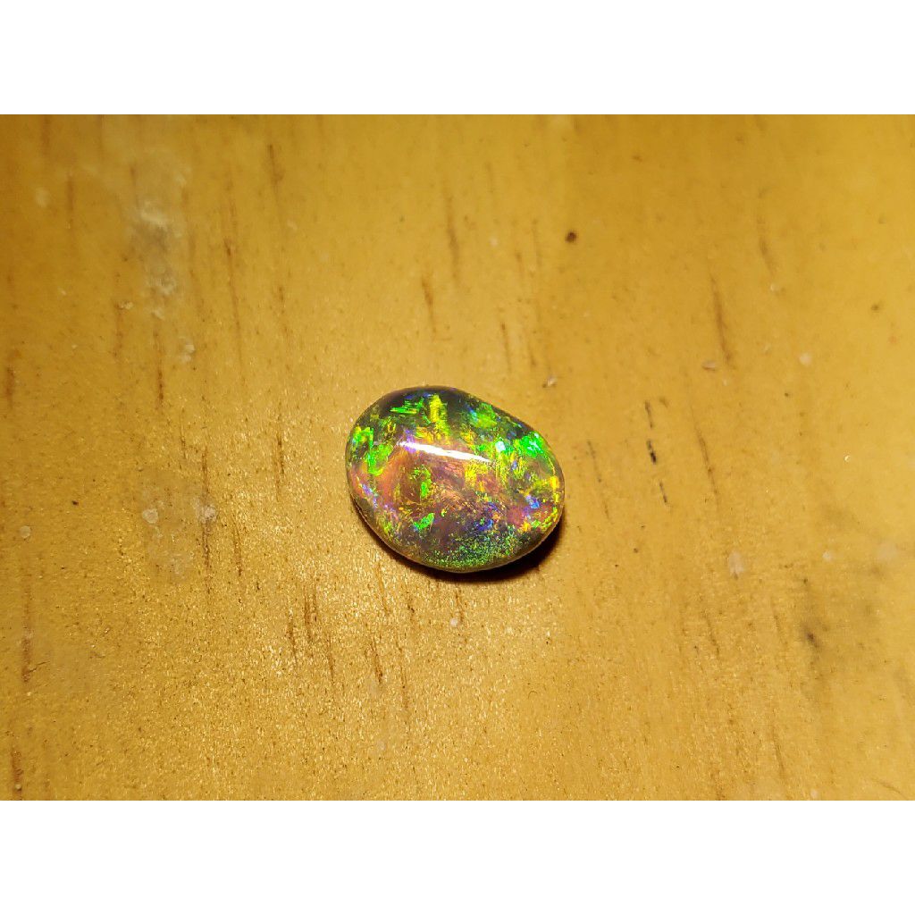 2.4ct oval bi-color opal