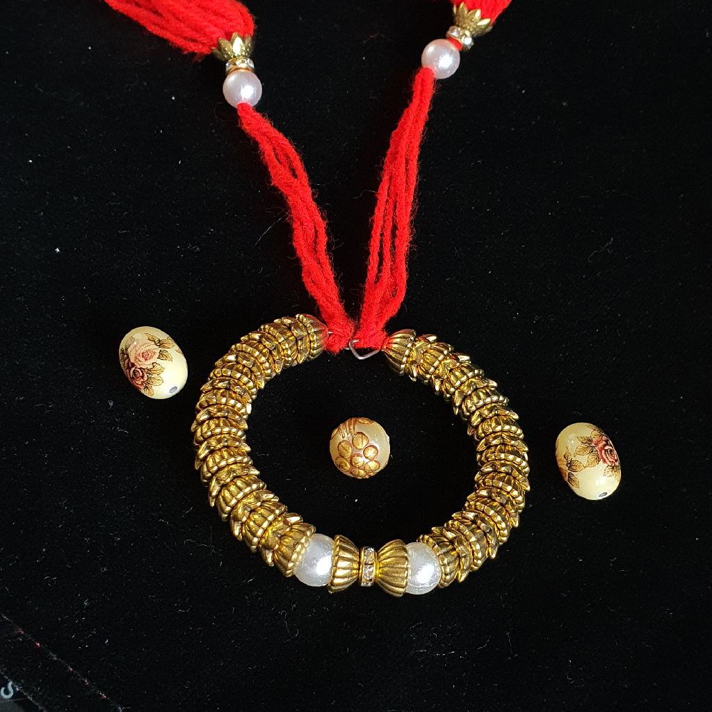 Fancy design golden colour bhabhi rakhi