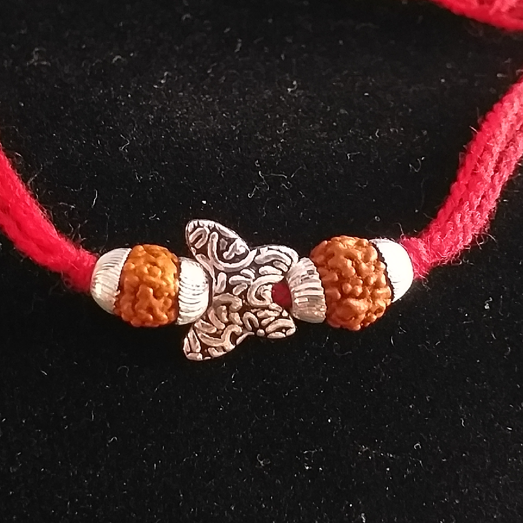Silver rudraksh & butterfly design rakhi - Image 2