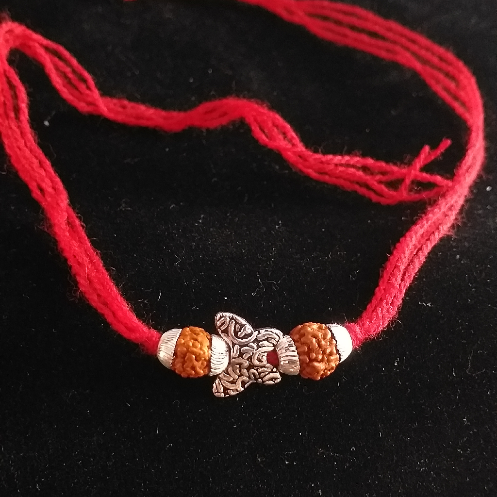 Silver rudraksh & butterfly design rakhi
