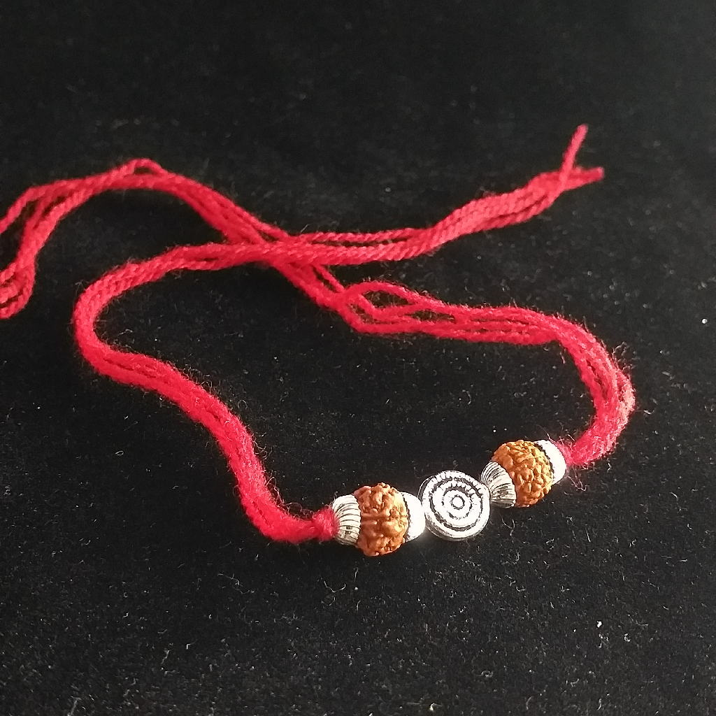 Silver Rudraksh & Fancy Brouch Rakhi